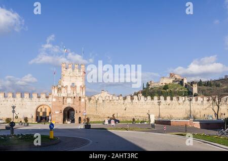 The imposing walls surrounding the medieval castle of Soave, near Verona in Italy, built in the XIII century on a hill Stock Photo