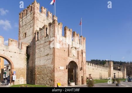 Soave, Italy (28th December 2019) - The imposing medieval walls that surrounds the town and the castle of Soave near Verona Stock Photo