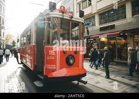 Turkey, Istanbul, December 29, 2019 - A traditional old-fashioned or retro tram moves along Istiklal Street in the Taksim district of Istanbul. Stock Photo