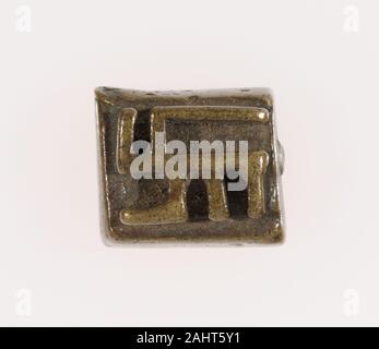 Asante. Goldweight with a Geometric Design. 1700–1899. Ghana. Copper alloy Akan gold weights depict both figural and abstract forms. They were cast by the Akan and Akan-related people of Ghana and Côte d’Ivoire and used for weighing gold dust from the 15th to the 19th centuries. The earliest forms—like this example—were based on abstract motifs, reflecting the Islamic influence on the gold trade prior to the arrival of the Portuguese in the 1470s.–Permanent Collection Object Description Stock Photo