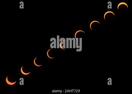 Partial Total Solar Eclipse phases. Composite Solar Eclipse. Last eclipse of the decade. Ring of fire eclipse view from Dubai. Stock Photo