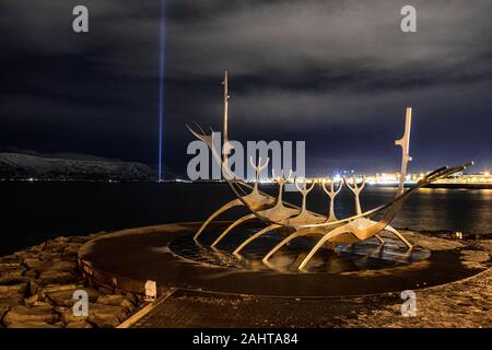 The IMAGINE PEACE TOWER, It is dedicated to the memory of John Lennon, Reykjavík’s harbour, The Sun Voyager is a sculpture by Jón Gunnar Árnason, Sun Stock Photo