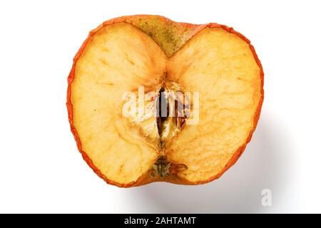 cut out section of an overripe apple on white background Stock Photo