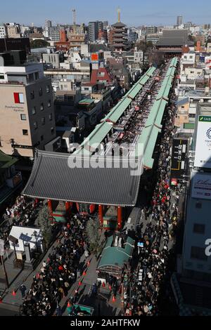 Tokyo, Japan. 1st Jan, 2020. People go to Senso-ji temple for Hatsumode, or their first temple visit of the year, at Senso-ji Temple in Asakusa area, Tokyo, Japan, Jan. 1, 2020. Credit: Du Xiaoyi/Xinhua/Alamy Live News Stock Photo