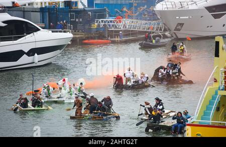 Poole, UK. 1st Jan 2020.   General mayhem during the annual New Year's Day Bath Tub Race on Poole Quay in Dorset . Credit: Richard Crease/Alamy Live News Stock Photo