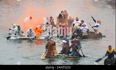 Poole, UK. 1st Jan 2020.   General mayhem during the annual New Year's Day Bath Tub Race on Poole Quay in Dorset . Credit: Richard Crease/Alamy Live News Stock Photo