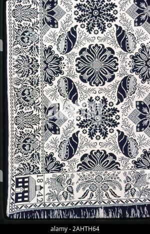The Craig coverlet, a double Jacquard weaving, features dark blue and ...
