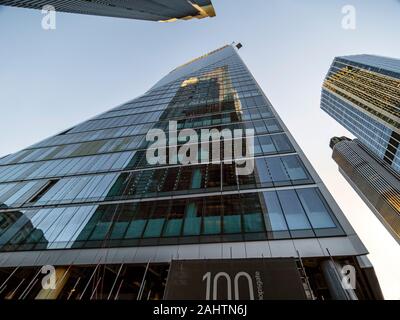 LONDON, UK - SEPTEMBER 27, 2018:   100 Bishopsgate Building - Reflection of a skyscraper in the building in the City of London