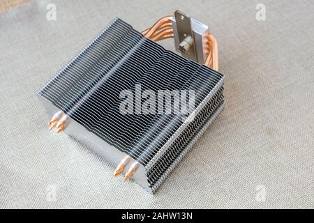 Personal computer new part heating radiator cooler thermostat made from aluminum metal. Stock Photo