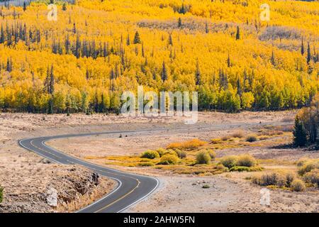 Winding autumn road through the San Juan Mountains of Colorado along Route 149 near Lake City Stock Photo