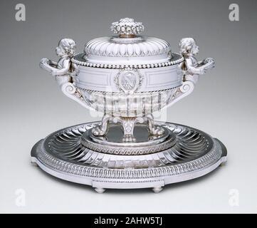 François-Thomas Germain. Tureen and Stand. 1773–1774. France. Silver Jean-François Dapcher, whose maker’s mark is on this early Neoclassical tureen, was a pupil of the great Parisian silversmith and goldsmith François-Thomas Germain (1726–1791). At the time the tureen was produced, Germain was on the run for bankruptcy, and forbidden by law from making or marking silver. This may have obliged him to leave his masterworks unsigned and opt for cover by his apprentice, Dapcher.The Stroganov coat of arms, emblem of one of the grandest Russian noble families, is prominently featured on both sides o Stock Photo