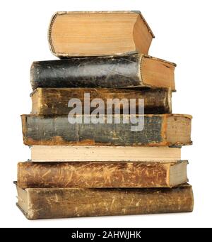 Isolated old books. Vintage leather books in a stack isolated on white with clipping path