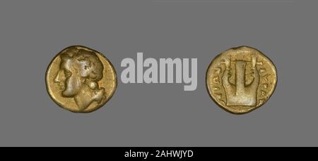 Ancient Greek. Coin Depicting the God Apollo. 357 BC–353 BC. Greece. Electrum Stock Photo
