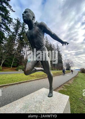 Statue of Olympic track and field runner Harry Winston Jerome (1940-1982), British Columbia's athlete of the century 1871-1971, in Stanley Park, Vanco Stock Photo