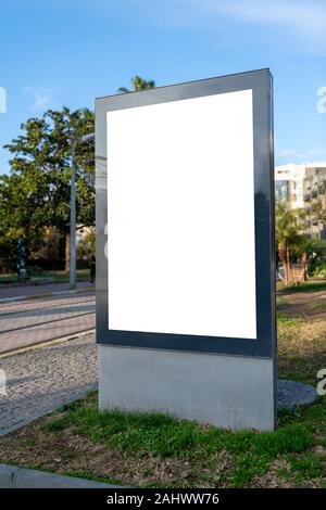 Pylon mock up in the city on sunny day. Blank billboard mockup Stock Photo