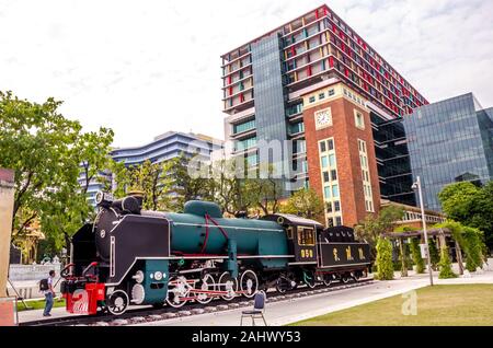 BANGKOK, THAILAND - December 23, 2018: Steam locomotive displayed at old Thonburi Station at Bangkok Noi district, now Siriraj Bimuksthan Museum. Stock Photo