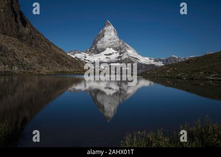 The Matterhorn reflected on the Riffelsee waters. Gornergrat. Switzerland Stock Photo