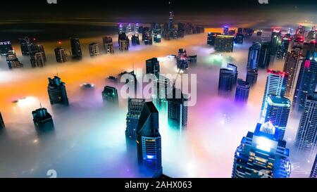 Dubai Skyscraper coverd with fog in winter Stock Photo