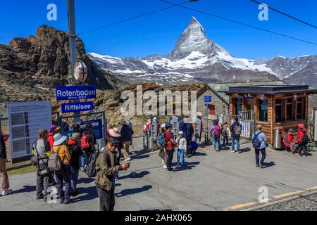 A Chinese group outside Rotenboden station next to the Matterhorn mountain, Switzerland Stock Photo
