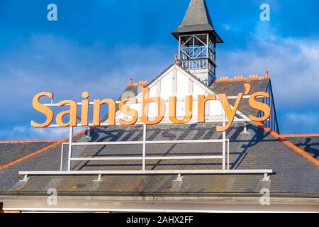 WREXHAM, UNITED KINGDOM - DECEMBER 25th, 2019: Sainsburys supermarket store sign Stock Photo