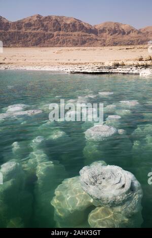 Salt chimneys form where fresh water flows into the Dead Sea and are exposed as water levels drop.  The Sea has the lowest elevation on earth. Stock Photo