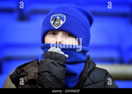 Oldham, UK. 01st Jan, 2020. OLDHAM, ENGLAND - JANUARY 1ST Oldham fans during the Sky Bet League 2 match between Oldham Athletic and Scunthorpe United at Boundary Park, Oldham on Wednesday 1st January 2020. (Credit: Eddie Garvey | MI News) Photograph may only be used for newspaper and/or magazine editorial purposes, license required for commercial use Credit: MI News & Sport /Alamy Live News Stock Photo