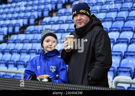Oldham, UK. 01st Jan, 2020. OLDHAM, ENGLAND - JANUARY 1ST Oldham fans during the Sky Bet League 2 match between Oldham Athletic and Scunthorpe United at Boundary Park, Oldham on Wednesday 1st January 2020. (Credit: Eddie Garvey | MI News) Photograph may only be used for newspaper and/or magazine editorial purposes, license required for commercial use Credit: MI News & Sport /Alamy Live News Stock Photo