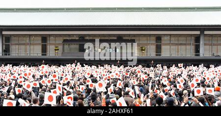 (L-R)Japan's Empress Emerita Michiko, Emperor Emeritus Akihito, Emperor Naruhito, Empress Masako, Crown Prince Akishino, Crown Princess Kiko, Princess Mako and Princess Kako wave to well-wishers during a new year greeting at the East Plaza, Imperial Palace in Tokyo, Japan, on Thursday, January 2, 2020. Japan's Emperor Naruhito delivered his first new year's address on his enthronement last year, expressing his sympathy to survivors of recent natural disasters and hope will be a peaceful year without any disaster and for the happiness for the people in Japan and around the world. Photo by K Stock Photo