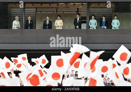 (L-R)Japan's Empress Emerita Michiko, Emperor Emeritus Akihito, Emperor Naruhito, Empress Masako, Crown Prince Akishino, Crown Princess Kiko, Princess Mako and Princess Kako wave to well-wishers during a new year greeting at the East Plaza, Imperial Palace in Tokyo, Japan, on Thursday, January 2, 2020. Japan's Emperor Naruhito delivered his first new year's address on his enthronement last year, expressing his sympathy to survivors of recent natural disasters and hope will be a peaceful year without any disaster and for the happiness for the people in Japan and around the world. Photo by K Stock Photo