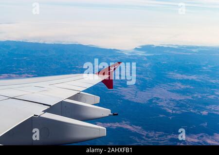 Smoke from bush fires seen from a Qantas Airbus A380 airliner approaching Sydney Airport at sunrise, Australia Stock Photo