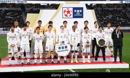 Tokyo, Japan. 1st Jan, 2020. Kashima Antlers team pose for a photo during the Emperor's Cup 99th Japan Football Association Championship awards ceremony. Vissel Kobe football team premieres at the New Japan National Stadium, becoming the first ever Vissel Kobe team to win an Emperor's Cup JFA championship. The game was held at the stadium that will serve as the main venue of the Tokyo 2020 Olympic Games. Photo taken onã€€Wednesday January 1, 2020. Photo by: Ramiro Agustin Vargas Tabares Credit: Ramiro Agustin Vargas Tabares/ZUMA Wire/Alamy Live News Stock Photo