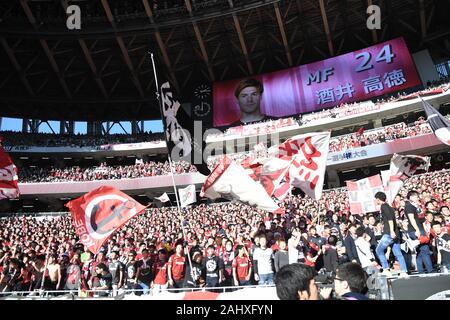 Tokyo, Japan. 1st Jan, 2020. A large screen displays at the New Japan National Stadium shows Sakai Gotaku during a players introduction, while fans cheer for their team. Vissel Kobe football team premieres at Japan National Stadium, becoming the first ever Vissel Kobe team to win an Emperor's Cup Japan Football Association Championship. The game was held at the stadium that will serve as the main venue of the Tokyo 2020 Olympic Games in Shinjuku City, Tokyo, Japan. Photo taken on Wednesday January 1, 2020. Photo by: Ramiro Agustin Vargas Tabares (Credit Image: © Ramiro Agustin Vargas Taba Stock Photo