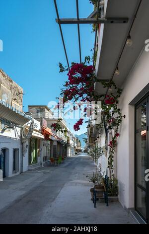 GREECE, KOS - MAY 31: Kardamena is a small town on the south coast of Kos and has all the makings of a great beach holiday. Empty central market stree Stock Photo