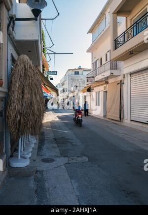 GREECE, KOS - MAY 31: Kardamena is a small town on the south coast of Kos and has all the makings of a great beach holiday. Central market street in m Stock Photo
