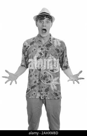 Portrait of young handsome tourist man ready for vacation Stock Photo