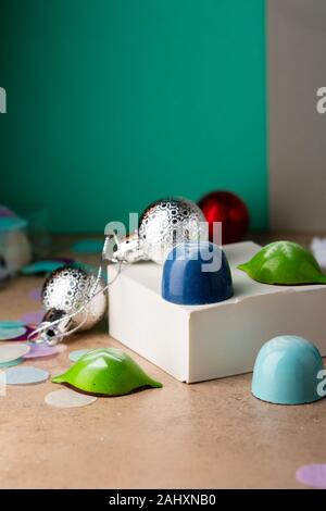 Holiday chocolate cand close-up and christmas decorations, copy space Stock Photo
