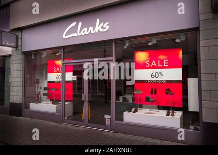 Sale at the Clarks shop in the shopping precinct at Corby town centre, Northamptonshire, England, on new year's day 2010 Stock - Alamy