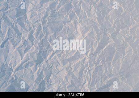 Crumpled paper background, wrinkled texture of sheet. Textured effect of page. Abstract pattern backgrounds, gray backdrop surface Stock Photo