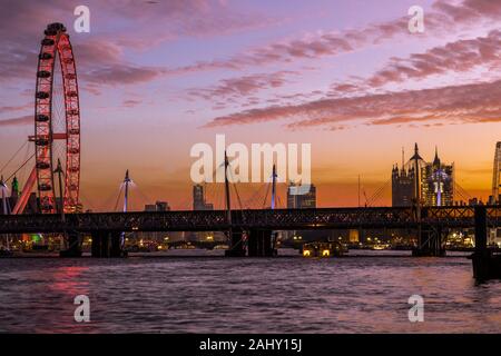 Landscape London skyline, London Eye, dusk, twilight, blue hour with the Southbank and River Thames travel destination, London England UK