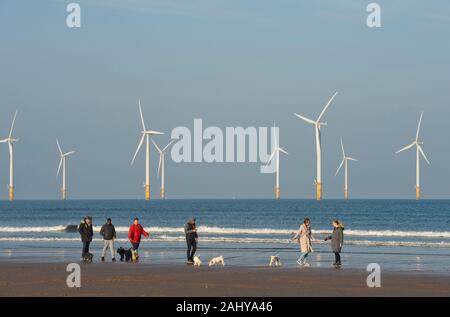 Families on Coatham beach, Redcar, Cleveland, UK Stock Photo