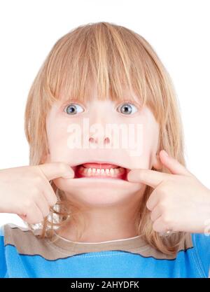 boy with long blond hair making scary faces - isolated on white Stock Photo