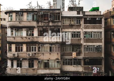 old building facade, run down house exterior, HongKong Stock Photo