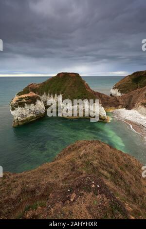 Dramatic clouds over the Chalk cliffs at Flamborough Head, East Riding of Yorkshire, England, UK Stock Photo