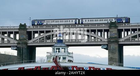 A Northern train travels along the High Level Bridge which carries both rail and road traffic across the Tyne between Newcastle upon Tyne and Gateshead, on the day that transport Secretary Grant Shapps signalled he wants to remove the franchise from Northern, warning he is “simply not prepared” for the service to carry on as it is. Stock Photo