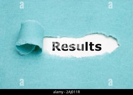 Printed word Results appearing behind torn blue paper. Stock Photo