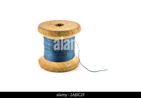 Spool with blue thread isolated on white background Stock Photo