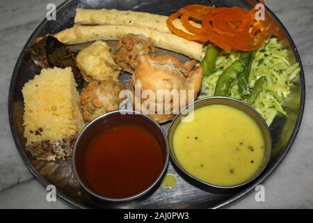 Traditional Guajarati breakfast of Fafda, Gathiya, Jalebi, Pakoda, Khaman Dhokla etc. Stock Photo