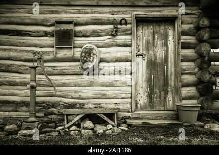 Simple Country Living. Exterior wall of a historical log cabin in Midwest America. Stock Photo