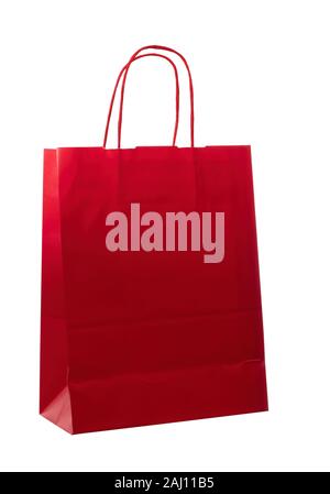 Red shiny paper carrier bag, shopper. Empty, upright and blank, isolated on white background. Ecological. Stock Photo