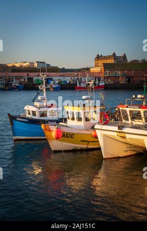 Scarborough harbour at daybreak in mid-winter. Stock Photo